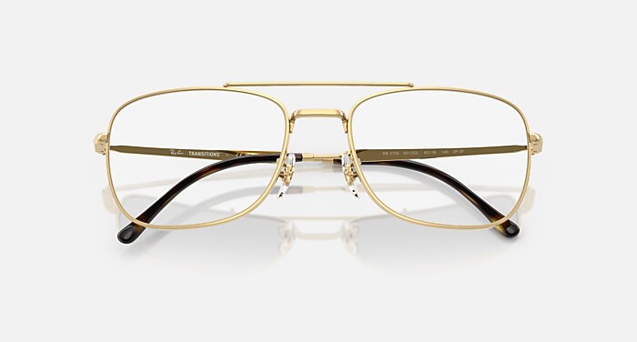 Ray-Ban ゴールド 調光サングラス　Transitions® レイバン Ray-Ban（レイバン）の「Ray-Ban レイバン サングラス RB3765