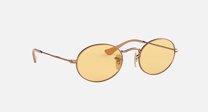 RAYBAN OVAL SUNGLASSES 
Polished Copper & Yellow Photochromic Amazon.com: Ray-Ban Unisex Rb1970 Oval Evolve Photochromic  main image 4