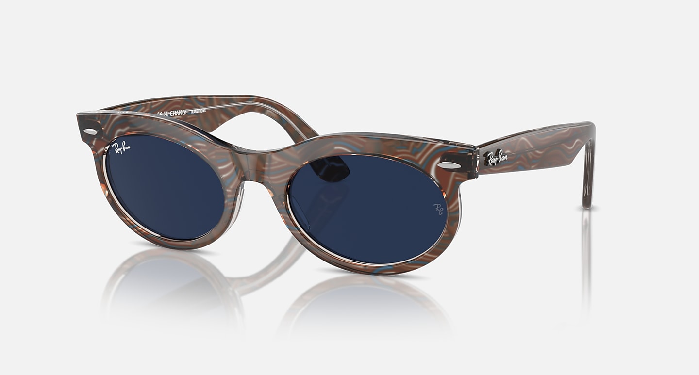 Check out the Wayfarer Oval Change Transitions® at ray-ban.com