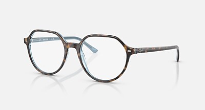 THALIA TRANSITIONS® Sunglasses in Transparent and Clear/Blue 