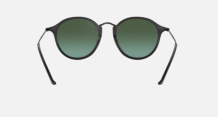 ROUND FLECK FLASH LENSES GRADIENT Sunglasses in Black and Orange 