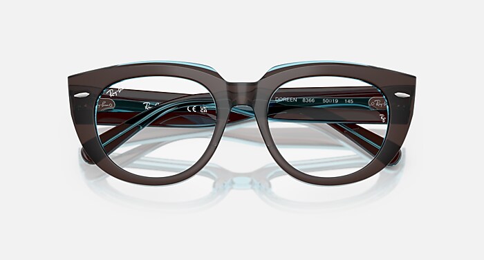 DOREEN OPTICS Eyeglasses with Brown On Transparent Blue and Clear