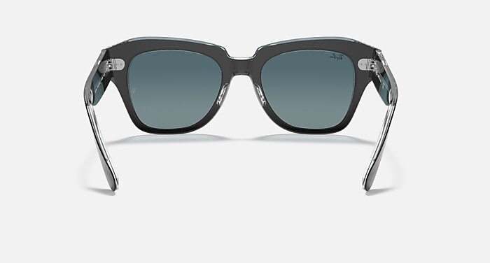 STATE STREET Sunglasses in Black On Transparent and Blue Gradient